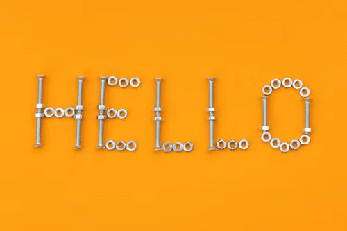 Word hello spelled on a yellow background