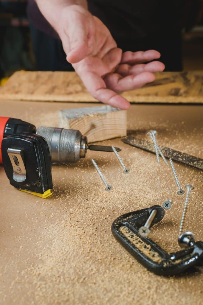 Hand tools and screws on the table