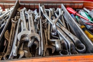 A box filled with lots of wrenches