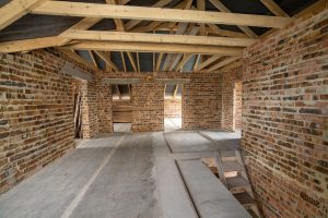 Interior of unfinished brick house